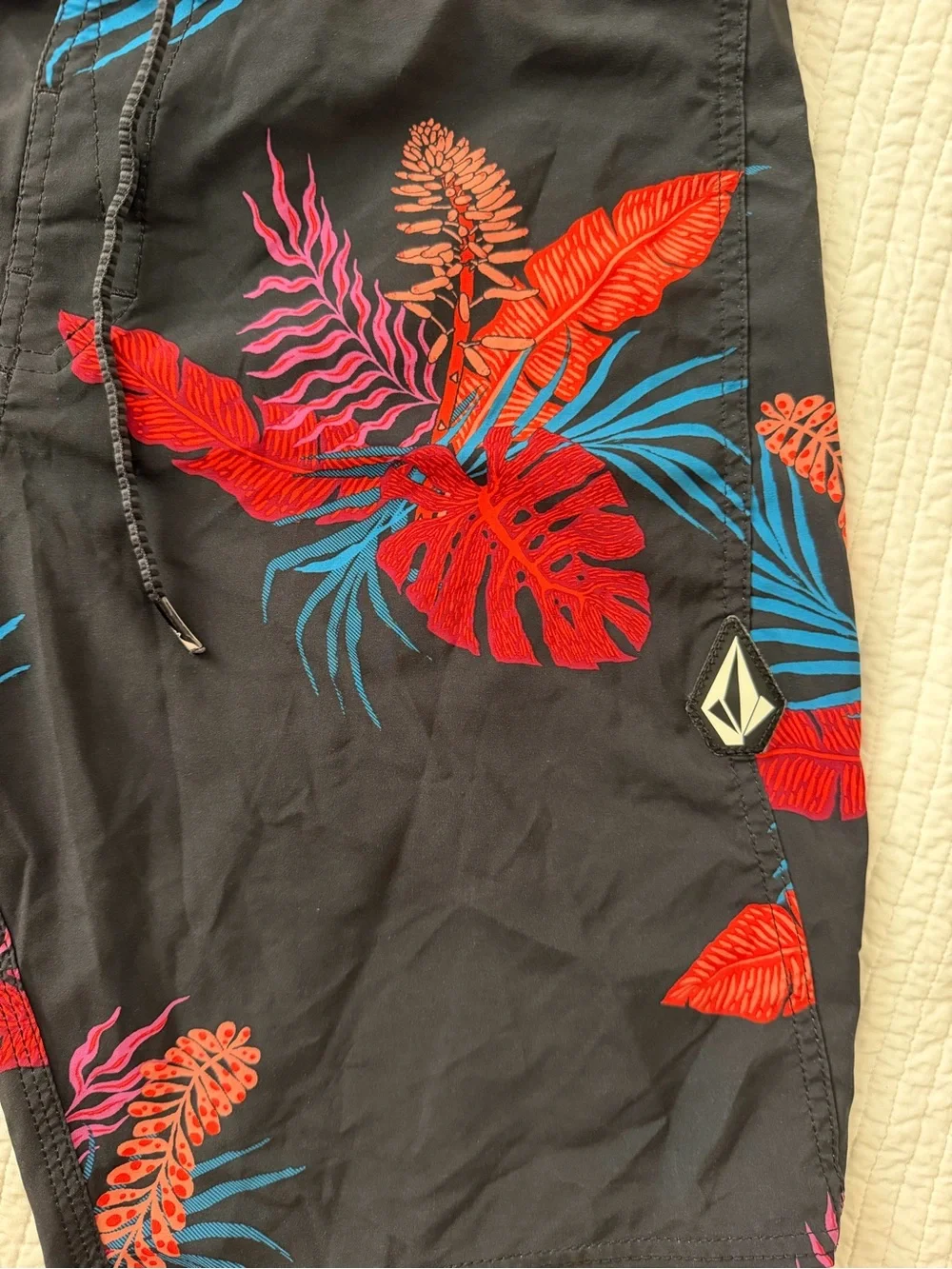 Volcom Black Board Shorts with Red, Pink & Blue Tropical Leaves